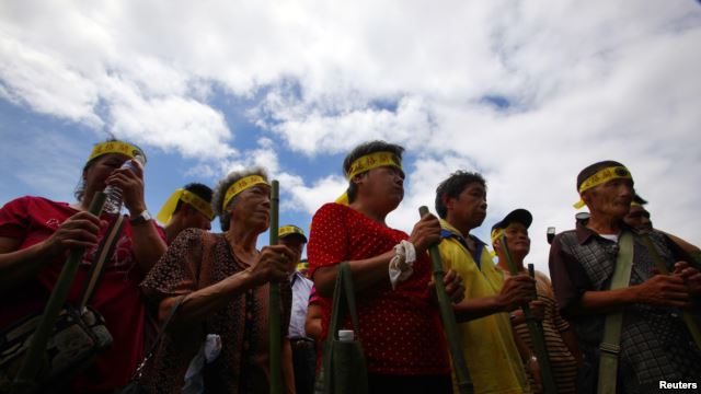 Des membres de la tribu Pingpu, protestant près du bureau présidentiel à Taipei, Taiwan, lors de la Journée internationale des populations autochtones du monde (PH/DR)