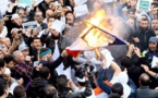 Drapeaux français brûlés en Algérie : Hollande exige des sanctions